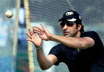 misbah should quit odis says wasim akram