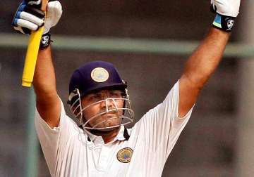 ms dhoni leads praise for sehwag compares him to viv richards