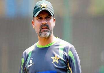 world cup 2015 pcb calls back chief selector moin khan over casino controversy
