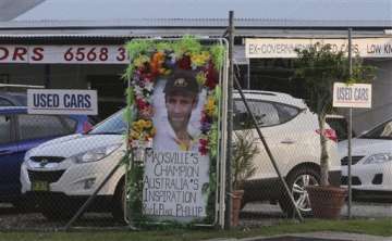 mourners converge on macksville to farewell hughes