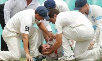 hughes hit by a bouncer in critical condition after surgery