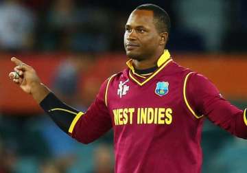 west indies all rounder marlon samuels suspended from bowling for 12 months