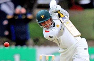 kamran akmal s ton helps pak rech 437 against tasmania