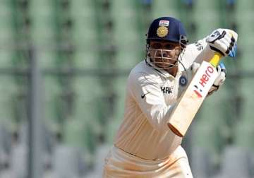 ranji trophy good show by sehwag unmukt as delhi take 1st innings lead