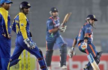 india crush lanka to storm into final