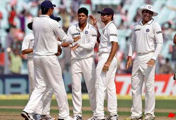 india crushes windies by an innings and 15 runs clinches series