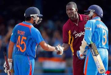 rohit steers india to four wicket win over wi in 1st odi