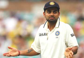 kohli fined for giving finger to crowd