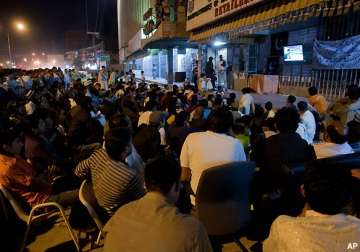 pak fans smash giant tv screens in karachi