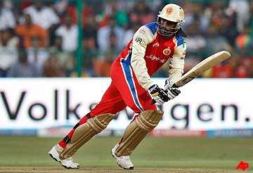 gayle helps rcb thrash csk to finish on top of league table