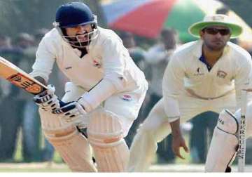 ranji day 2 karnatka in command rasool hits century