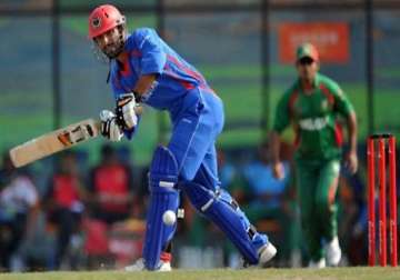 refugee to role model for afghan cricket skipper