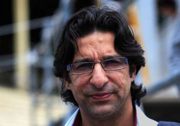 senior players may not be in dhoni s control says akram