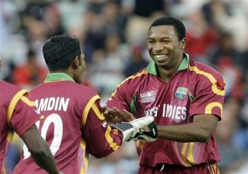 tri series johnson charles stars in west indies narrow win over india