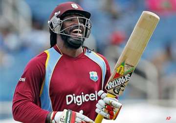 tri series gayle hits a ton west indies beat sri lanka by 6 wickets