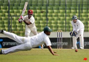 darren bravo smashes maiden century in dhaka test