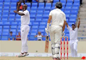 windies beat new zealand by 9 wickets in 1st test