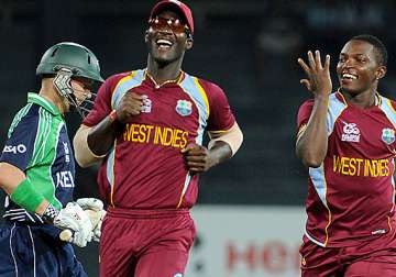 world t20 windies through to super eights after ireland match rained out