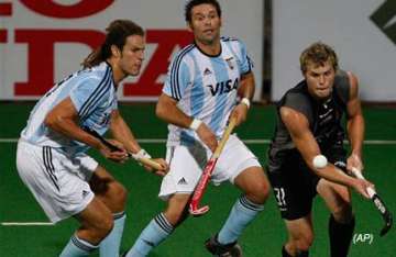 argentina register first win in hockey world cup