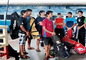 mumbai u 19 hockey players travel standing in train pantry near stinking toilets