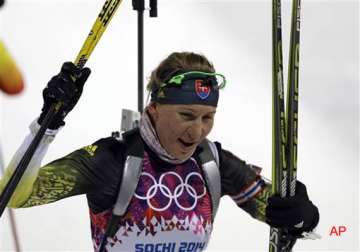 anastasiya kuzmina defends olympic title in biathlon sprint