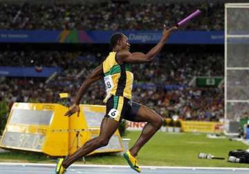 bolt leads jamaica to 4x100 world record