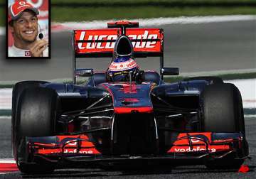 button edges vettel in f1 spanish gp practice