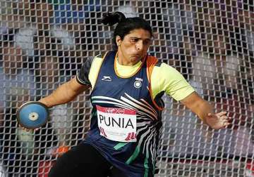 cwg 2014 seema wins silver poonia disappoints in women s discus