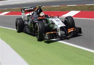 force india finish 9th 10th in spain