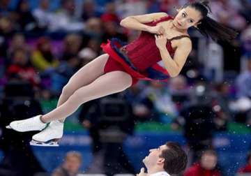 from distorted faces to crazy costumes figure skating has it all in sochi