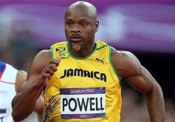 jamaican sprinter asafa powell runs fastest 100m this year