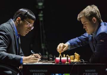 world chess championship anand draws with carlsen stays a point behind