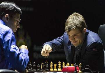 carlsen draws first blood takes early lead against anand