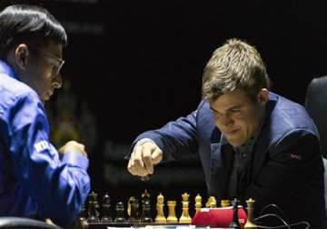 anand loses sixth game to carlsen trails by one point now