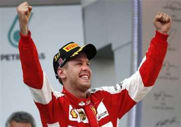 vettel wins malaysian gp to end mercedes streak