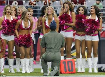 when an airman interrupts nfl game to propose to cheerleader girlfriend