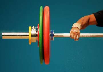 eight weightlifting coaches handed two year suspension