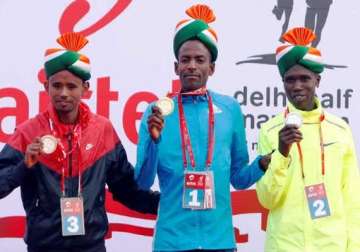 ethiopian guye adola wins delhi half marathon