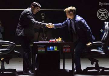 anand squares up with resounding win over carlsen