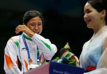 sarita devi suspension hc seeks responses of ioa boxing india