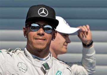 lewis hamilton takes pole position for belgian grand prix