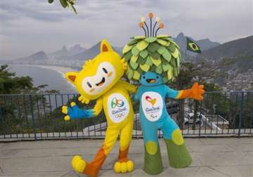 rio olympic mascot is a yellow cat like figure