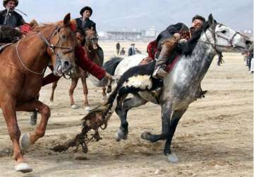 know about buzkashi a game played with headless goat carcass