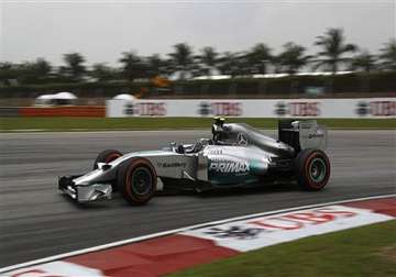 lewis hamilton takes pole at malaysian gp.