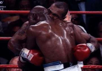 mike tyson returns evander holyfield s ear after 16 years