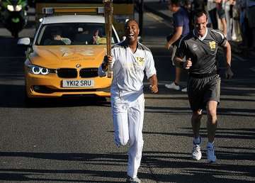 olympic torch becomes cultural happening in uk