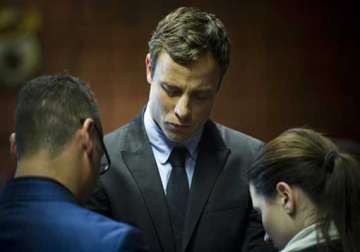 pistorius says he mourns for girlfriend he killed