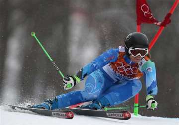 tina maze takes big lead in olympic giant slalom