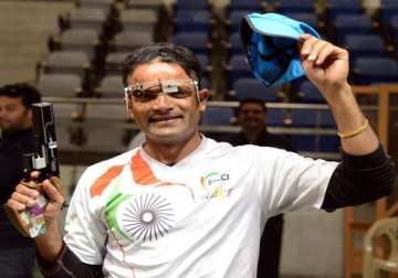 vijay heena clinch gold medals in shooting nationals