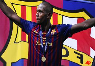 abidal weighing up barcelona deal extension